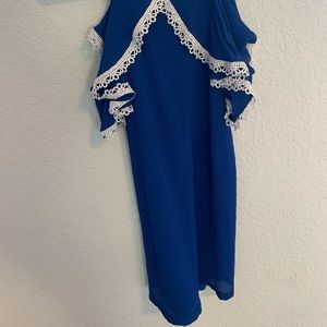 dark blue dress with white lace details